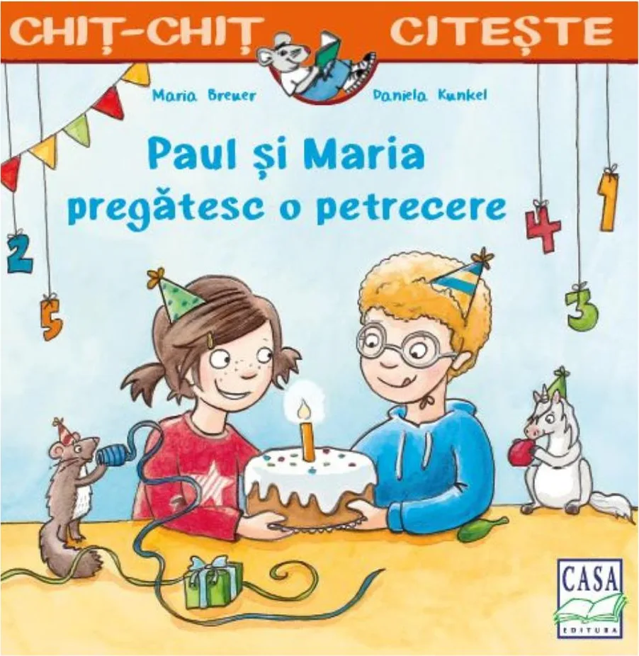 Coperta „Paul și Maria pregătesc o petrecere”: doi copii cu coronițe țin un tort cu o lumânare, între stegulețe